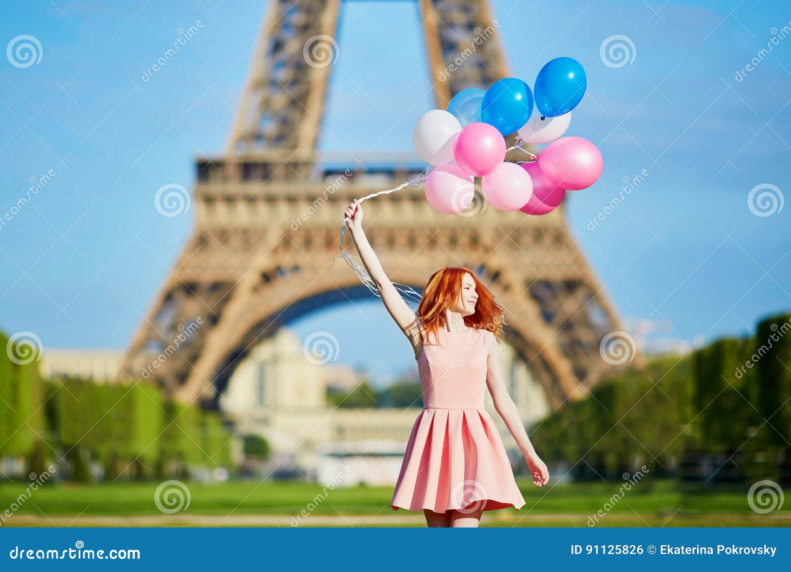 Woman in Pink Dress with Bunch of Balloons Dancing Near the Eiffel ...