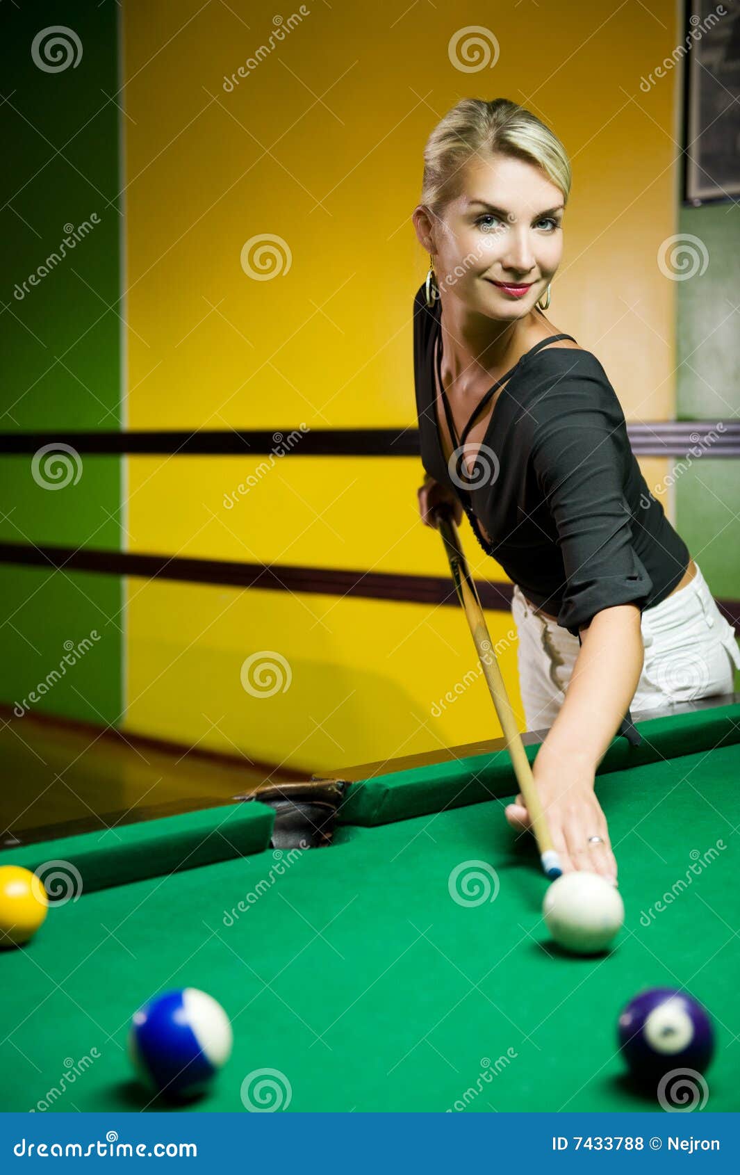 Woman playing billiards stock photo. Image of indoors 