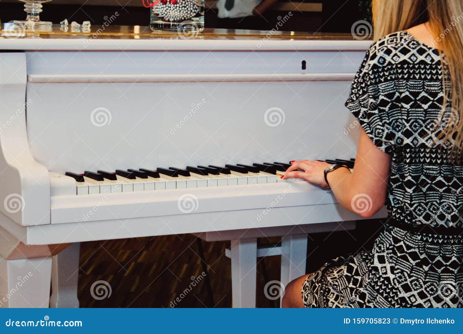 Woman Playing the White Piano Stock Image - Image of player, piano
