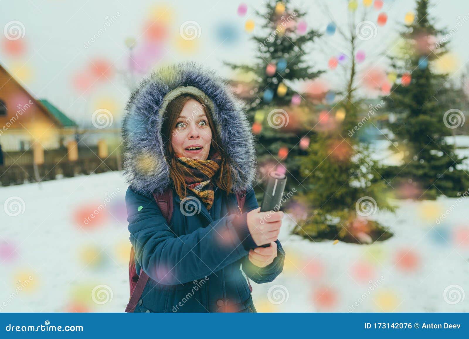 Woman Popping Confetti Petard and Screaming. Adult Female in Outwear ...