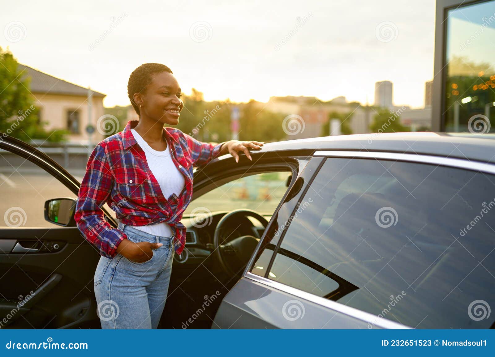 Woman Posing in Front of a Car · Free Stock Photo