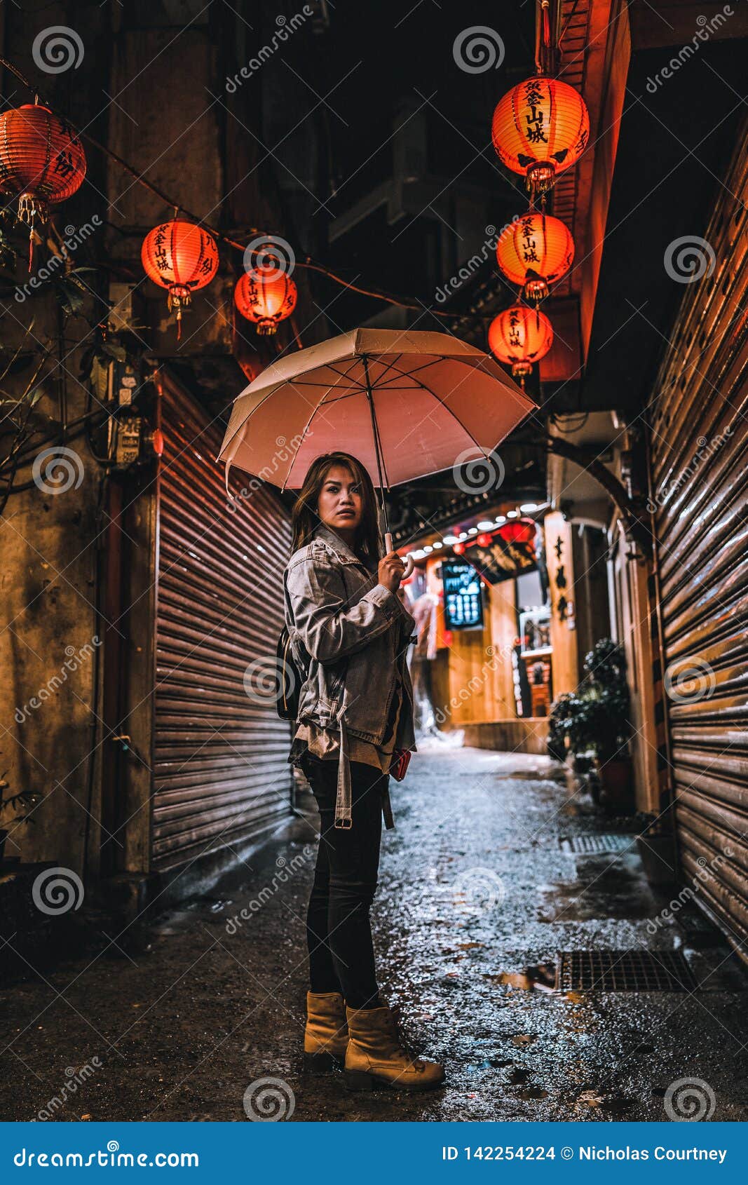 A Woman Poses on the Famous Old Street of Jiufen, Taiwan at Night. Stock  Photo - Image of tourist, taiwanese: 142253910