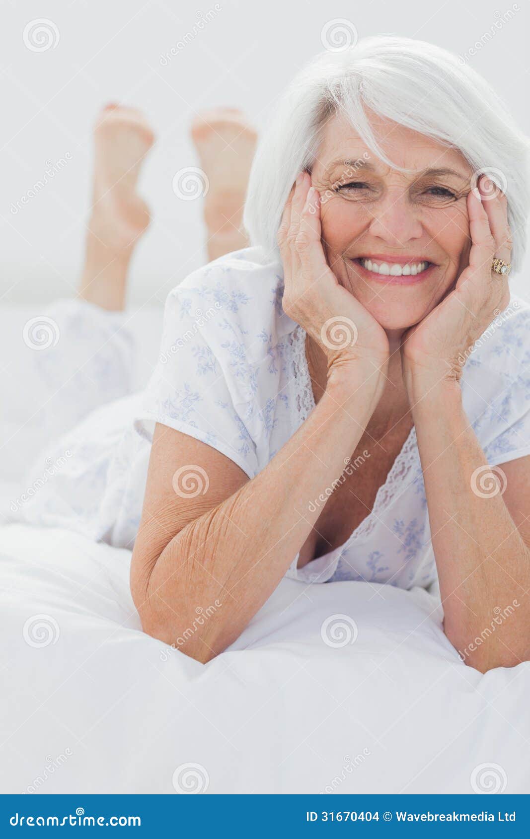 Woman Posing while she is Lying on Bed Stock Photo Image of pajama