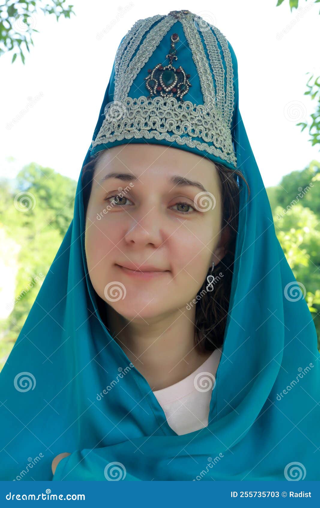 woman posing in national adyghe clothes in khadzhokh gorge