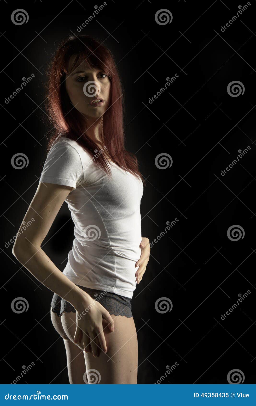 Woman Posing in White Shirt and Panties Stock Image - Image of
