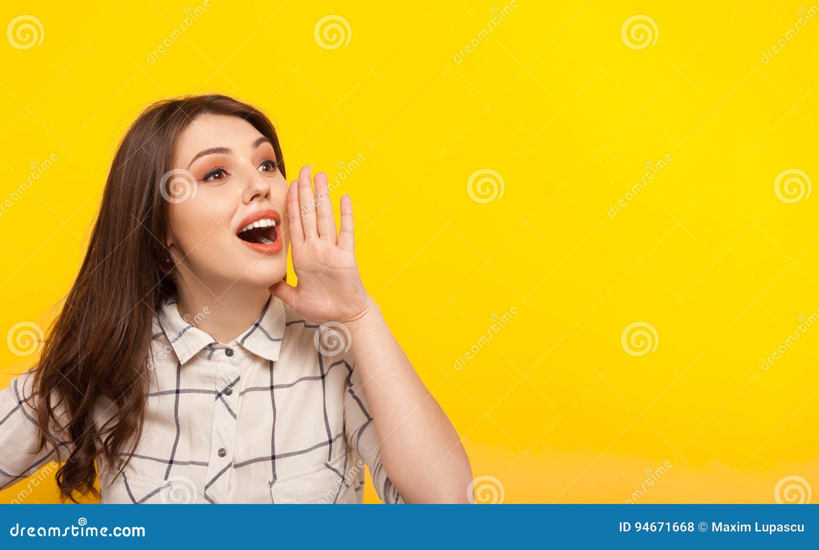 woman posing on yellow and calling