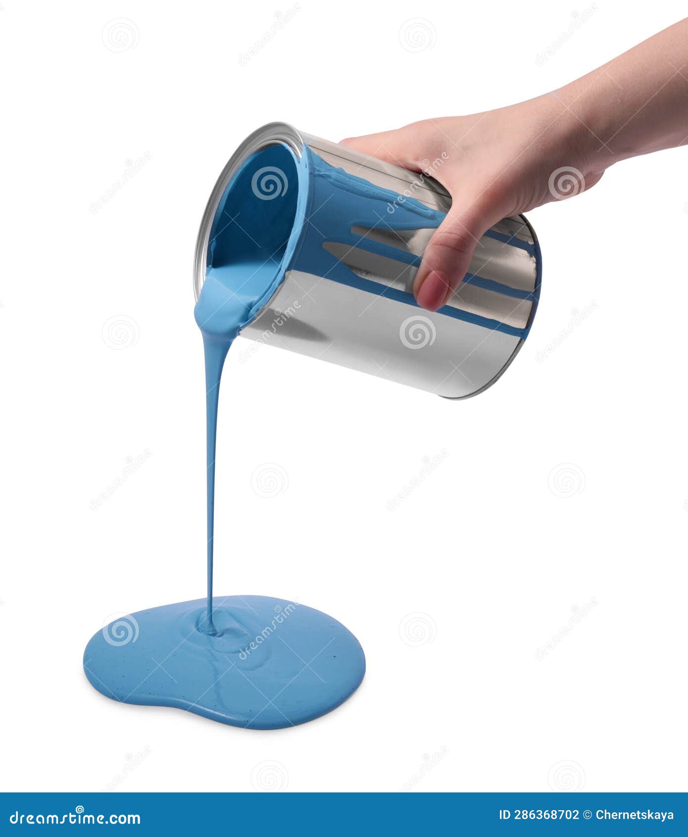 Hand pouring paint from tin can Stock Photo by ©anterovium 112589734