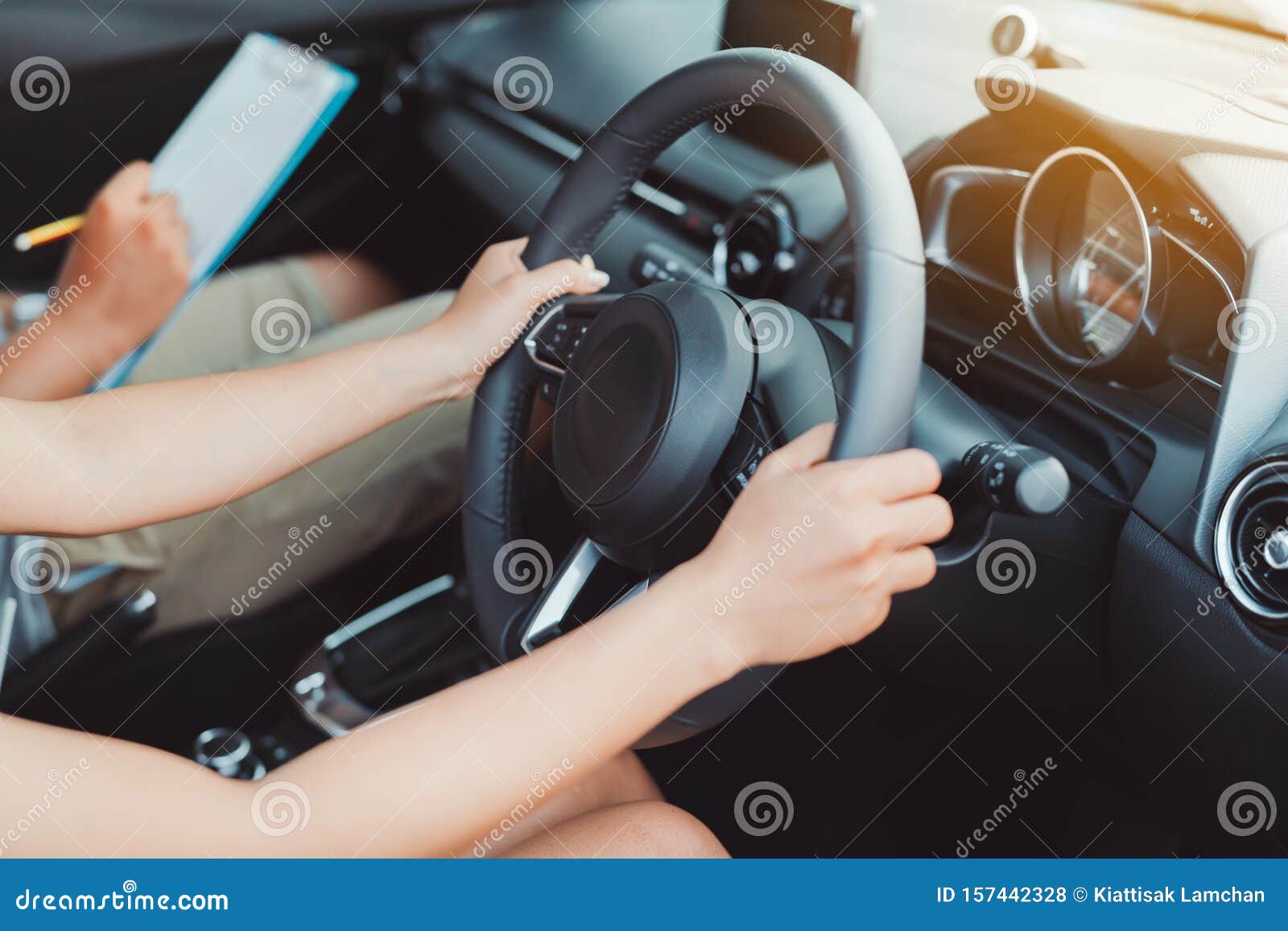 woman practice driving car exam driver licence control steering wheel