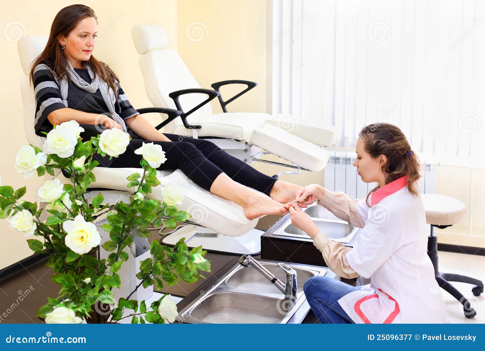 woman practices chiropody taking care of feet