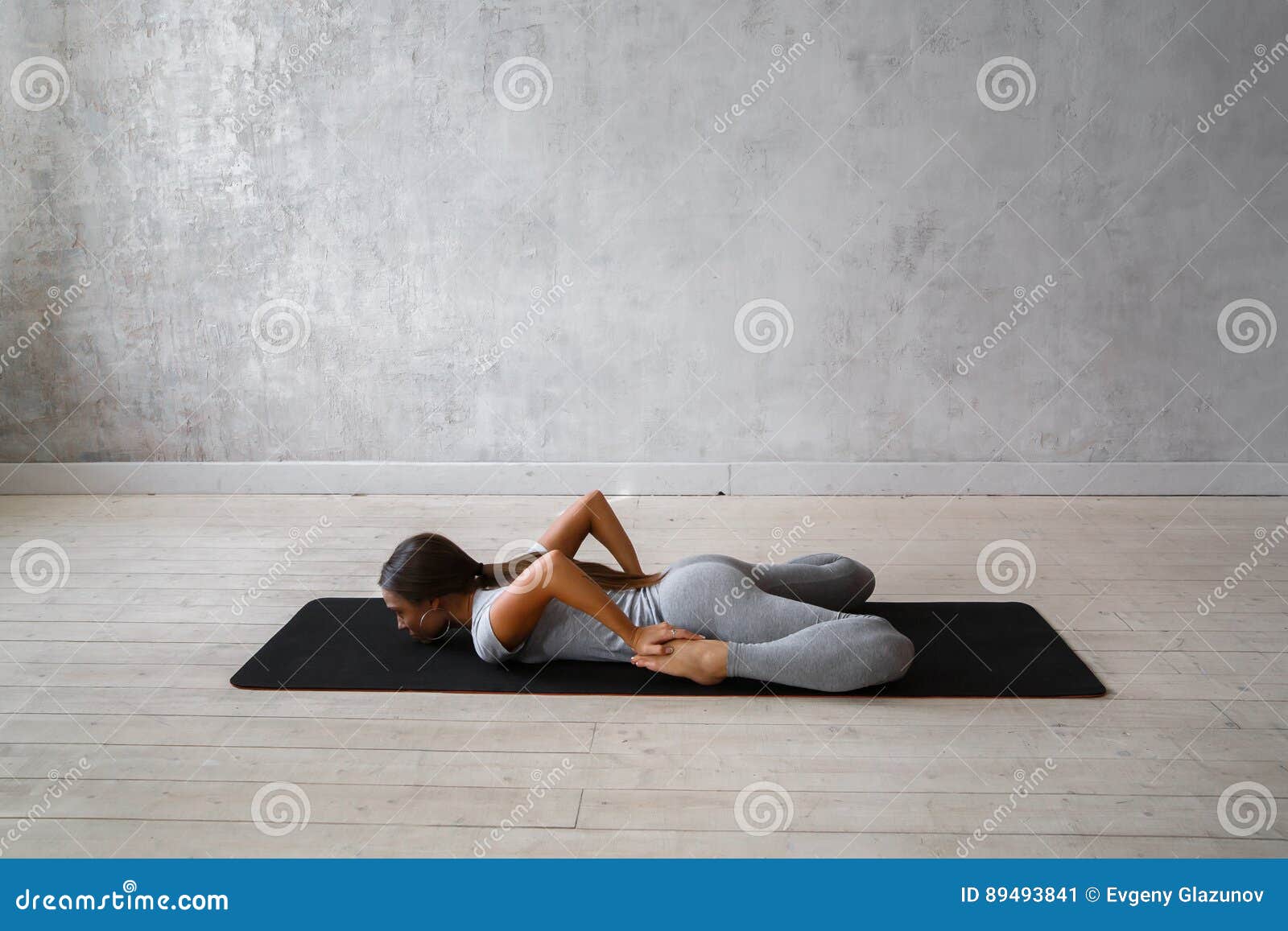 Advanced yoga poses. Young woman practicing Yoga pose. Woman