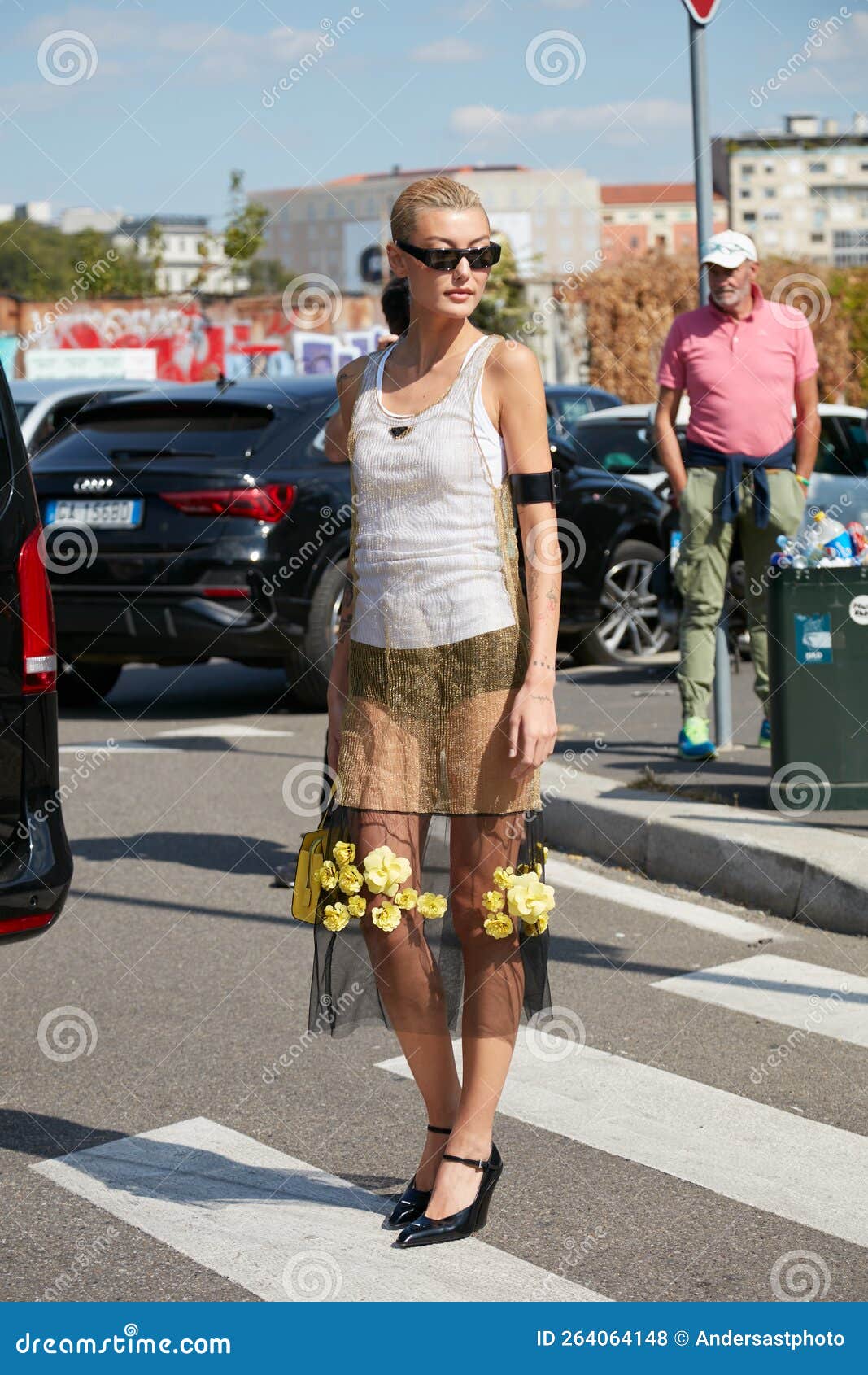 MILAN, ITALY - SEPTEMBER 24, 2021: Woman with black cargo trousers and pink  and black sunglasses before Prada fashion show, Milan Fashion Week street  Stock Photo - Alamy
