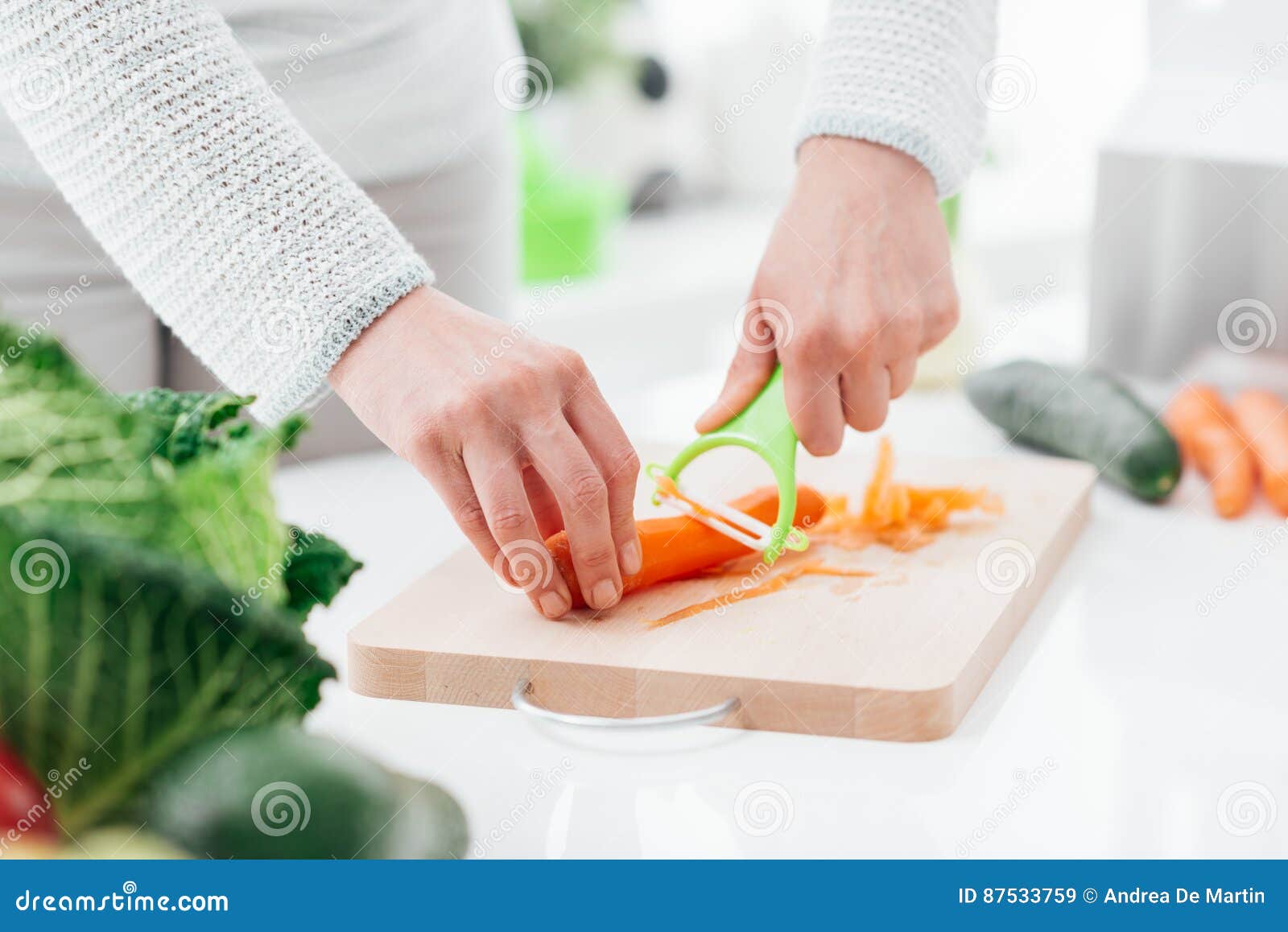 Woman preparing carrots stock image. Image of carrots - 87533759