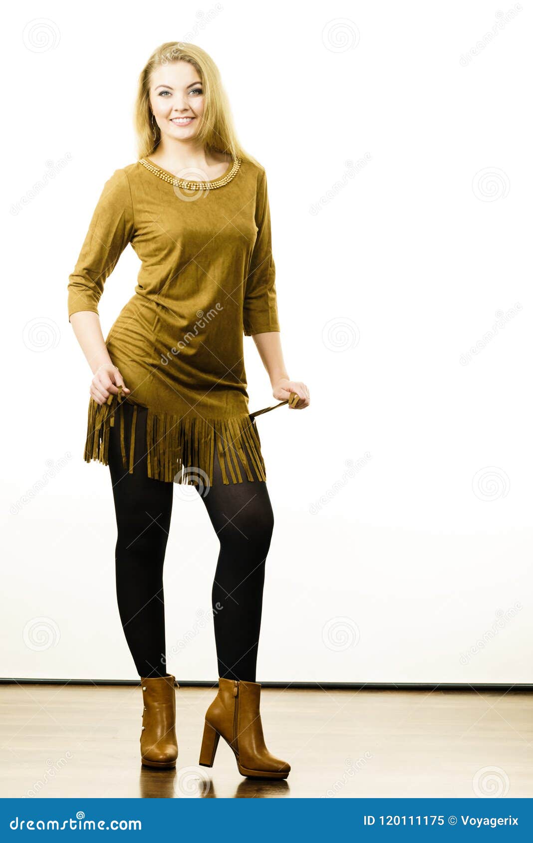 https://thumbs.dreamstime.com/z/woman-presenting-autumn-outfit-fashionable-wearing-long-khaki-vintage-dress-black-leggings-brown-high-heels-boots-autumnal-120111175.jpg