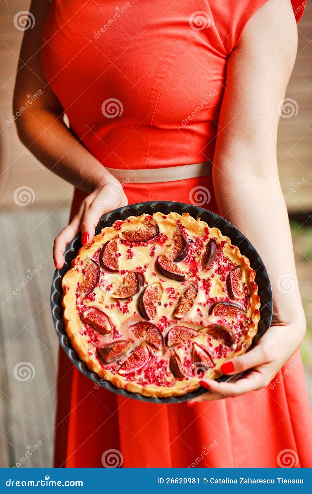 Woman presenting tart stock image. Image of dress, body 26620981