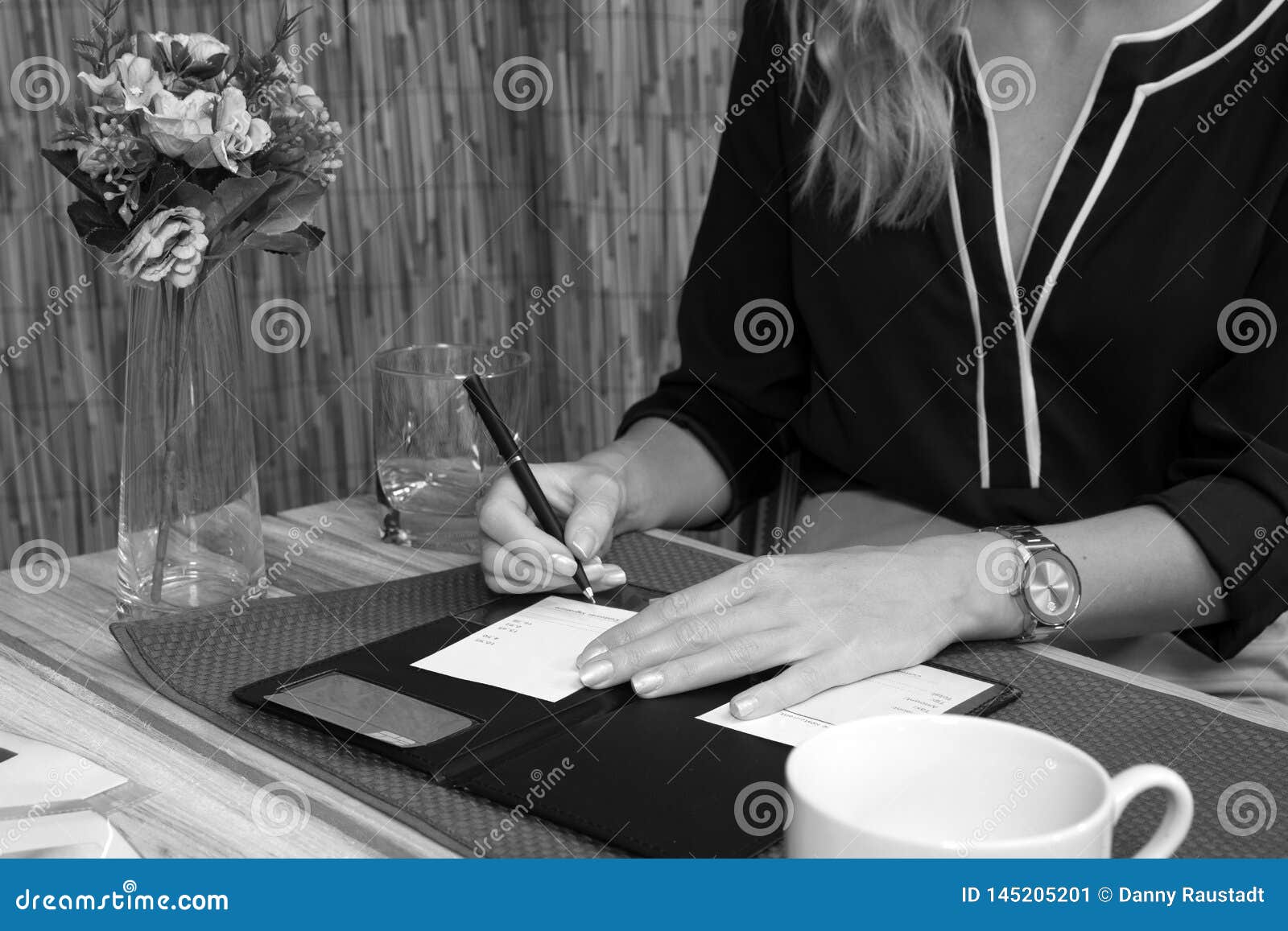 Woman Signs Credit Card Receipt At Restaurant Stock Image - Image of discover, dinner: 145205201