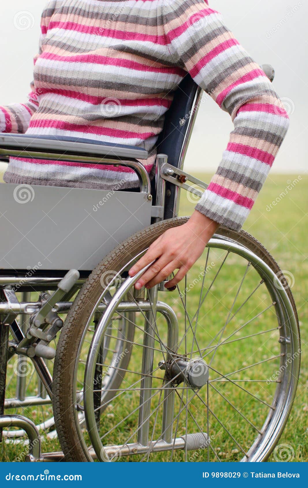 Woman Propelling Wheelchair Stock Image Image of green, hand 9898029