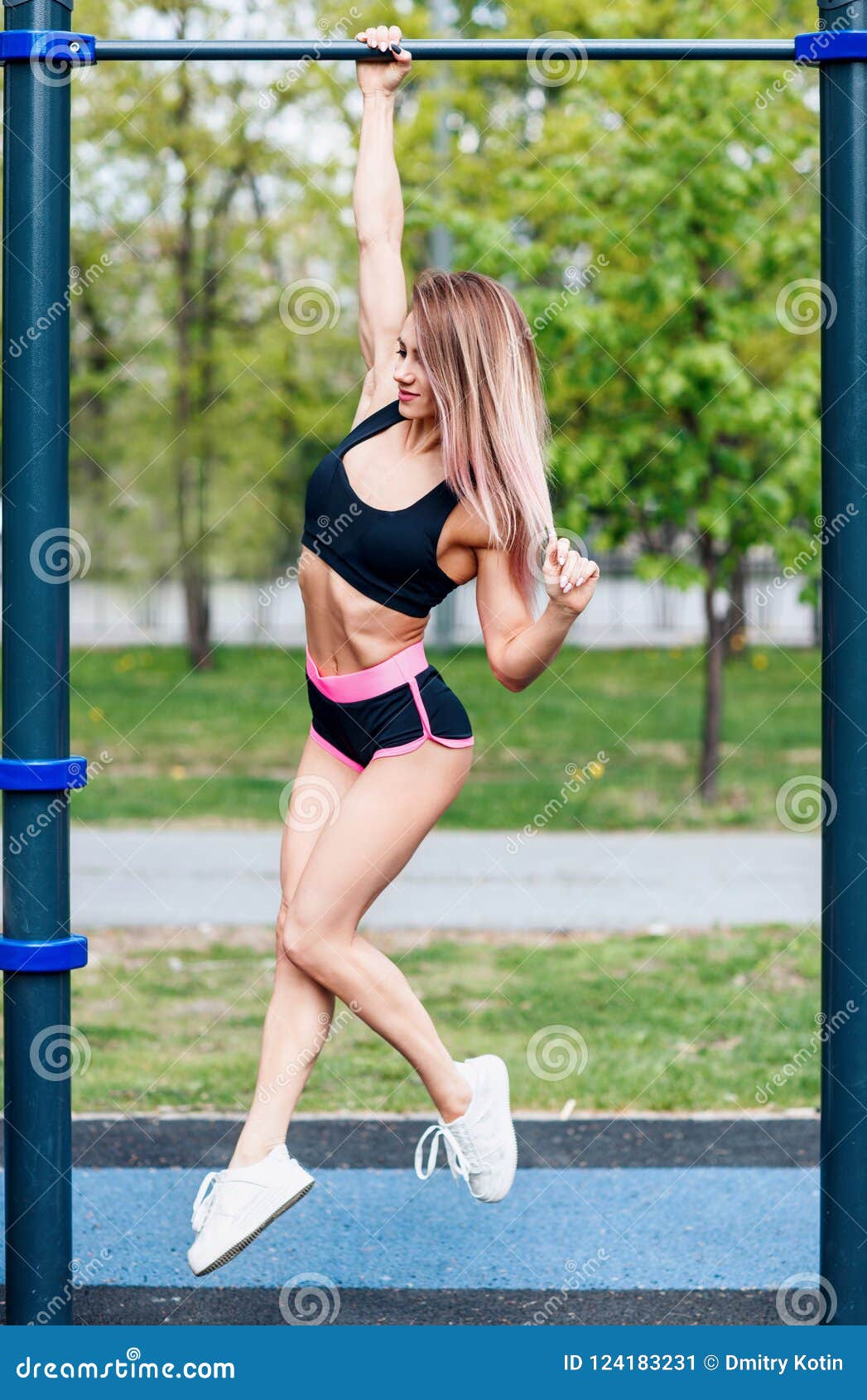 Woman Pull-ups Herself Up on Bar on Sports Ground in Park. Stock Image -  Image of arms, caucasian: 124183231