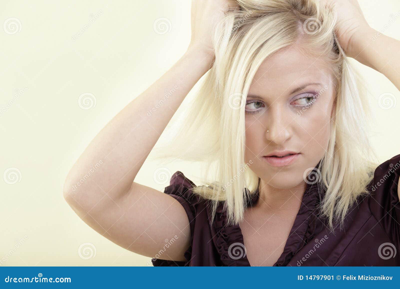 Woman pulling on her hair stock image. Image of glance 14797901