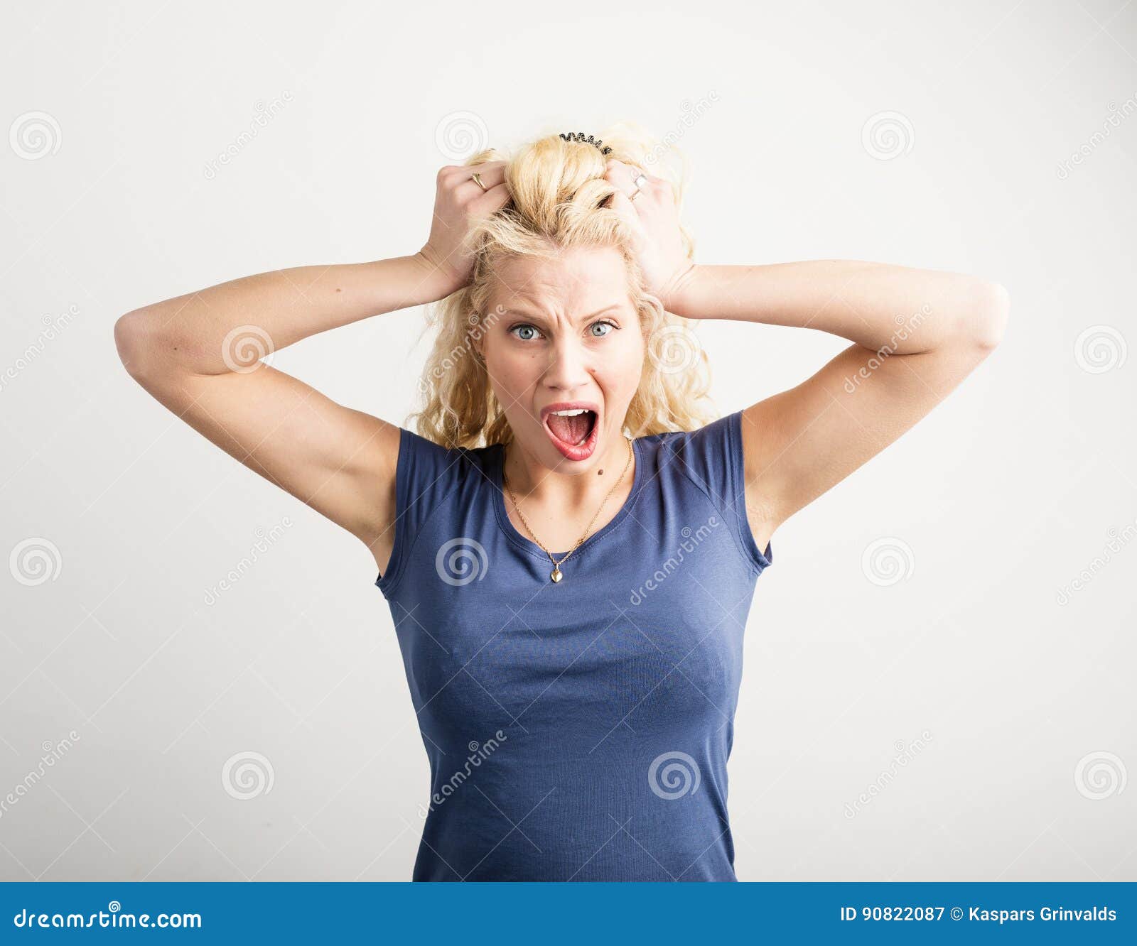 woman pulling her hair out