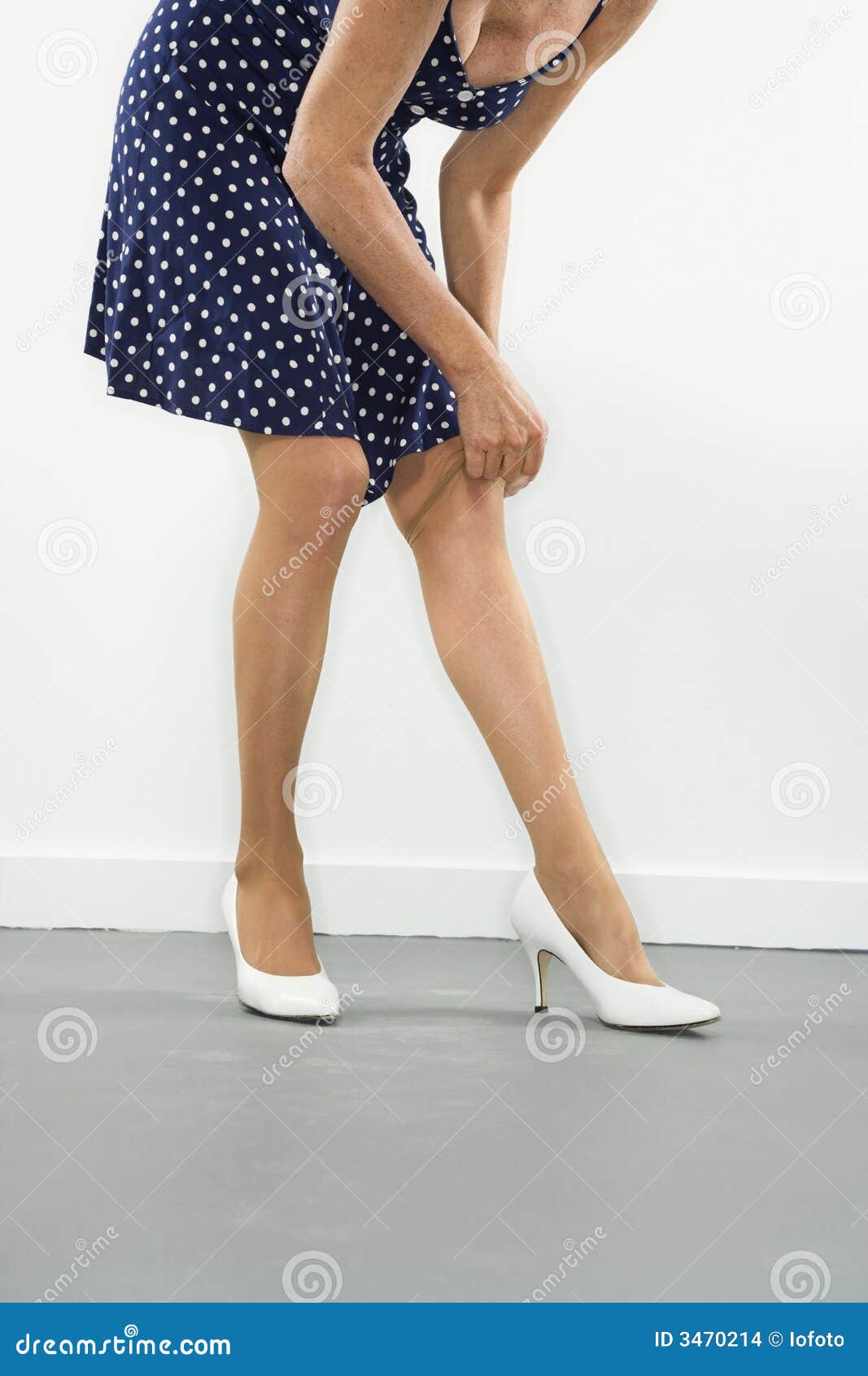 Woman Pulling Stockings Stock Photos photo image pic