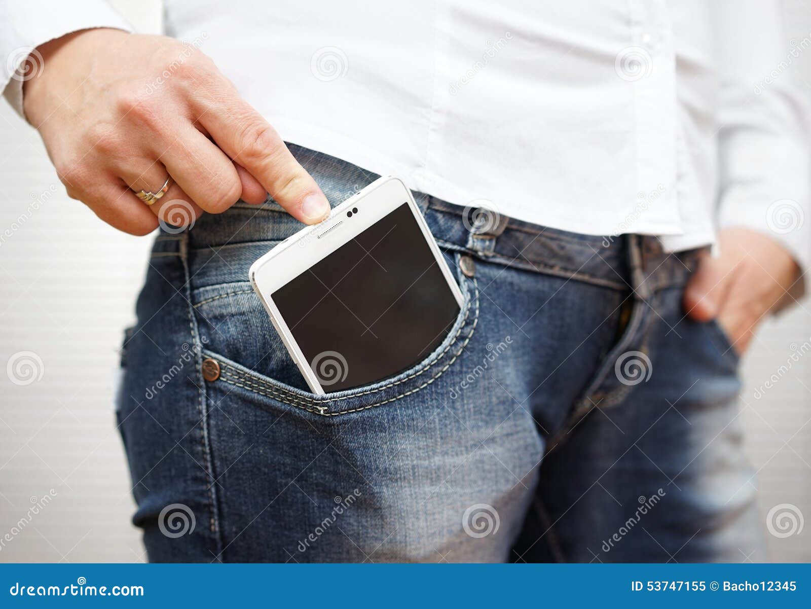 Woman Pushing Big Mobile Phone in Jeans Pocket Stock Image Image of pocket, shirt 53747155