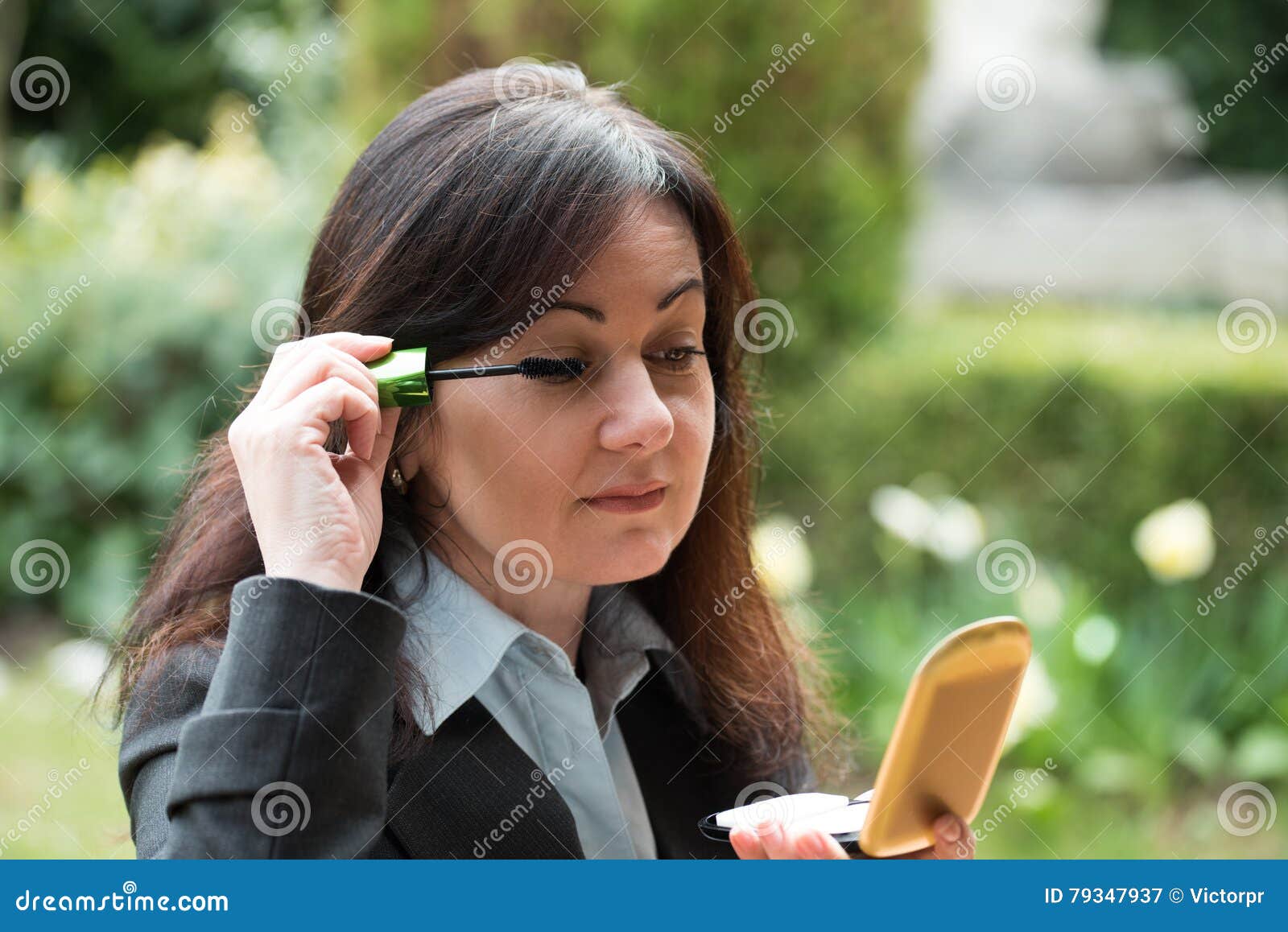 Woman Puts Make Up Stock Image Image Of Holding Makeup 79347937