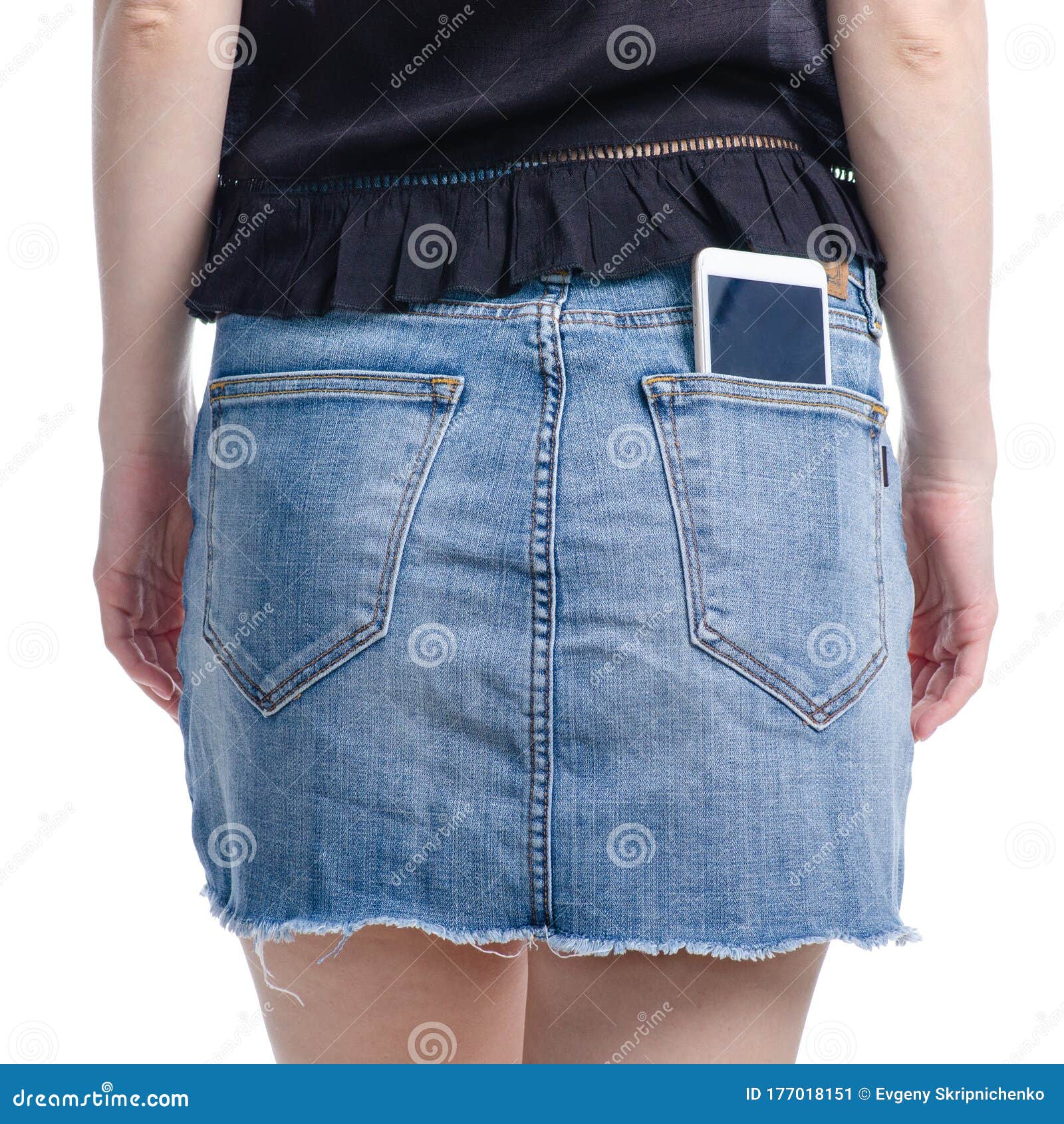 Woman Puts Mobile Phone in Jeans Skirt Pocket Stock Image - Image of ...