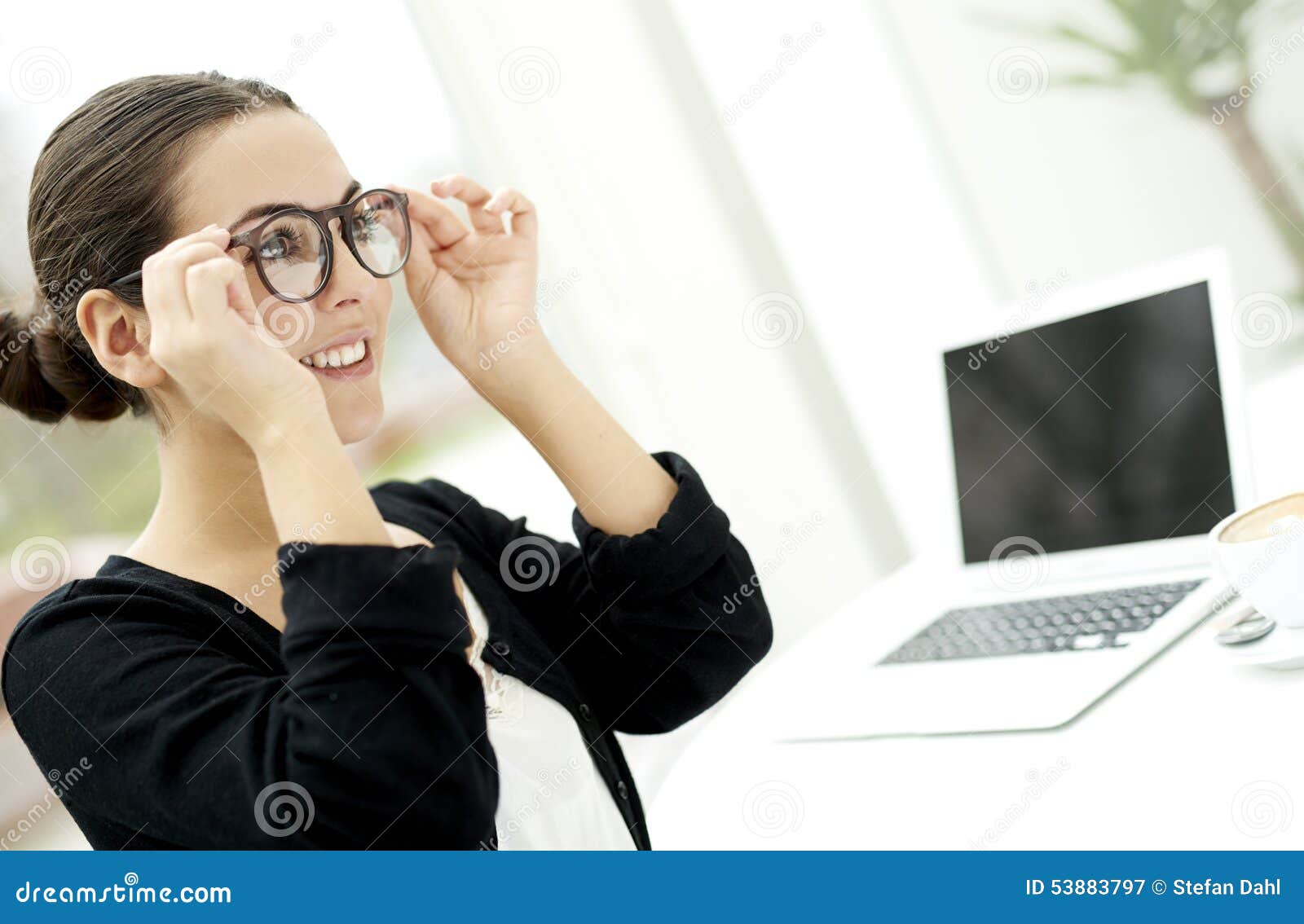 Woman putting on glasses stock image. Image of woman 53883797