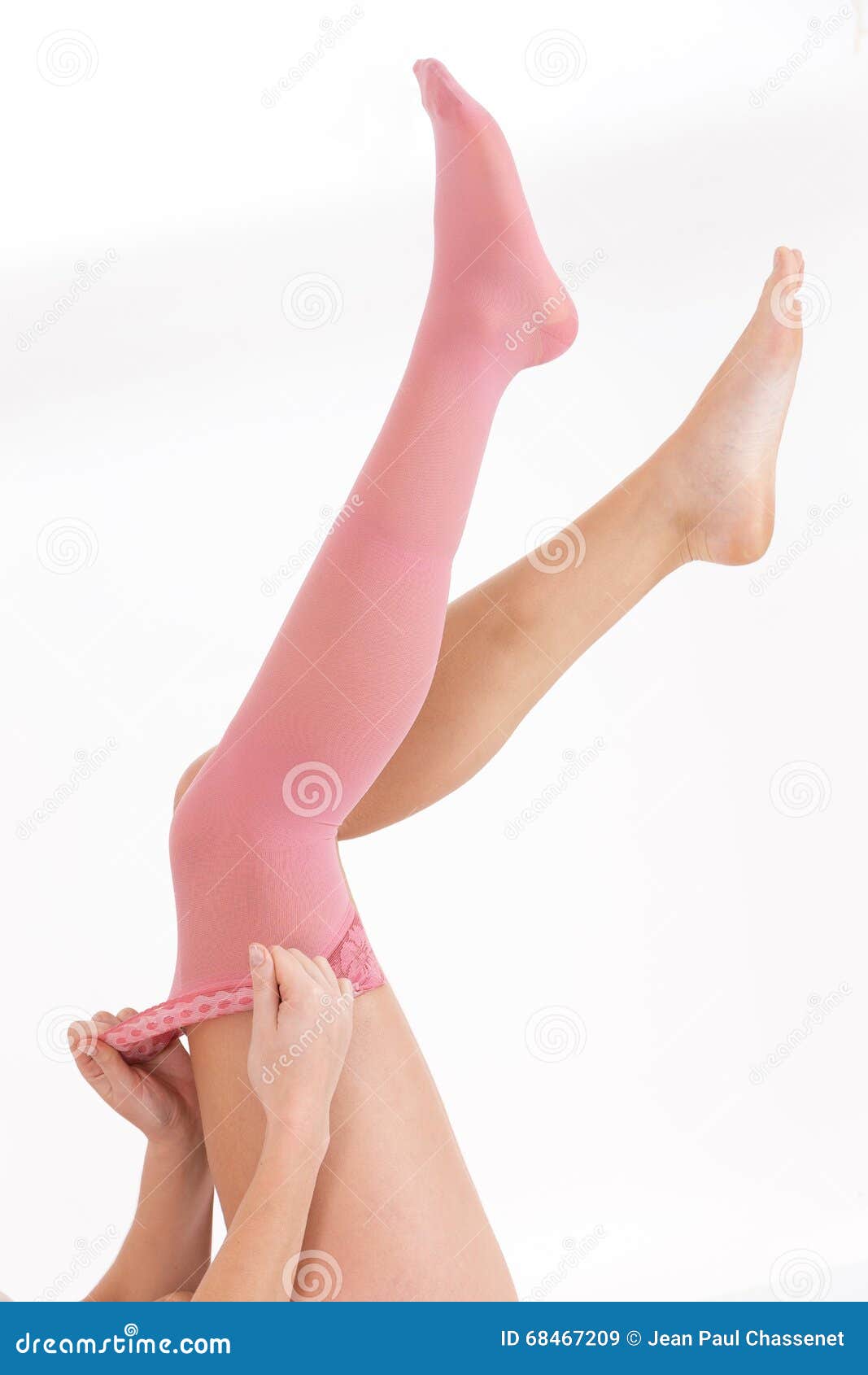 Premium Photo  Female hands of young woman putting on stocking
