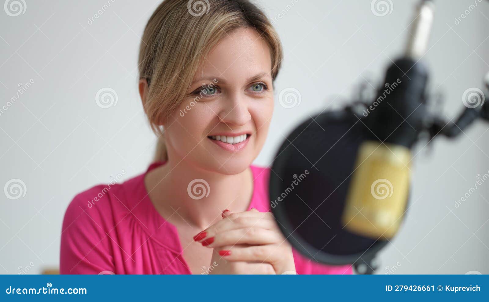 Woman Radio Presenter Speaking into Microphone in Recording Studio ...