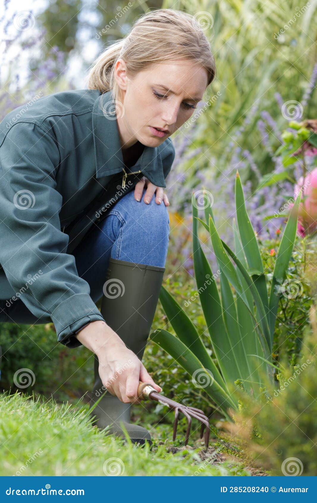 Woman with rake stock photo. Image of nature, years 285208240