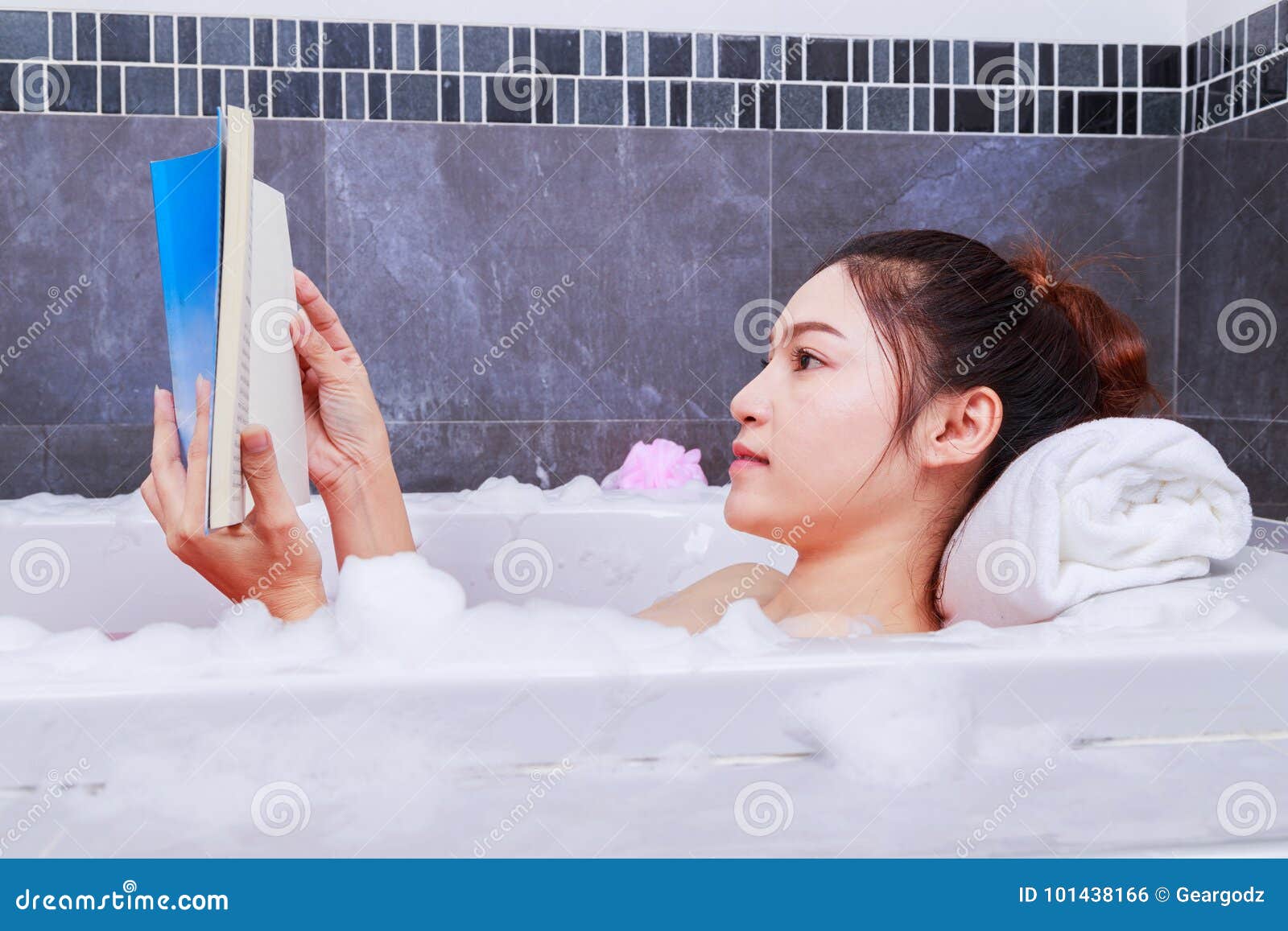Woman Reading Book in Bathtub in Bathroom Stock Photo Image of