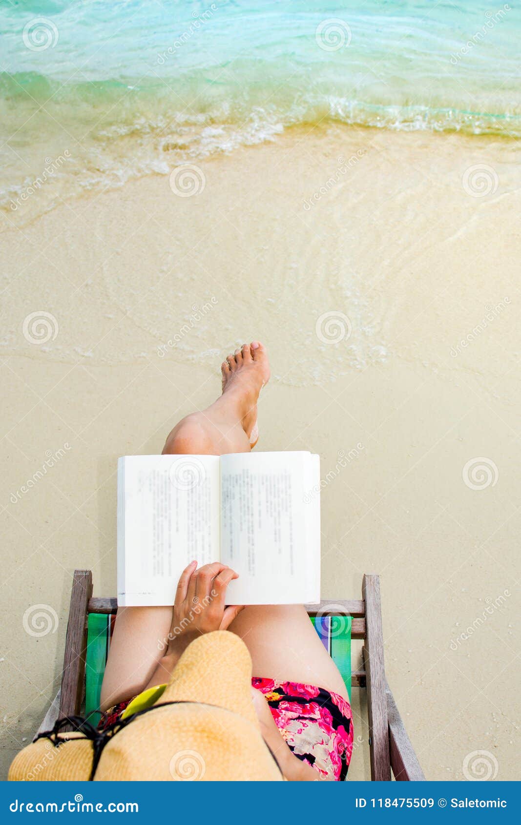 Woman Reading a Book in Sunbed at the Beach Stock Image Image of