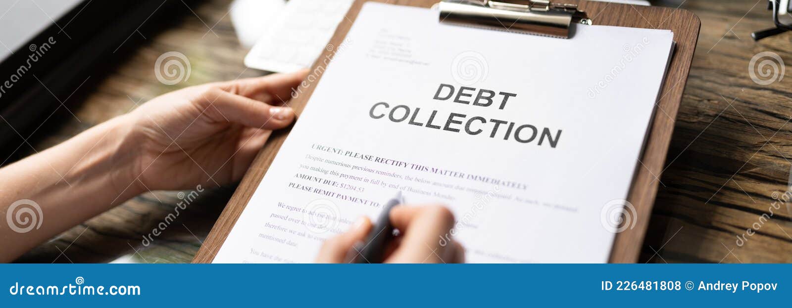 woman reading debt collection notice letter