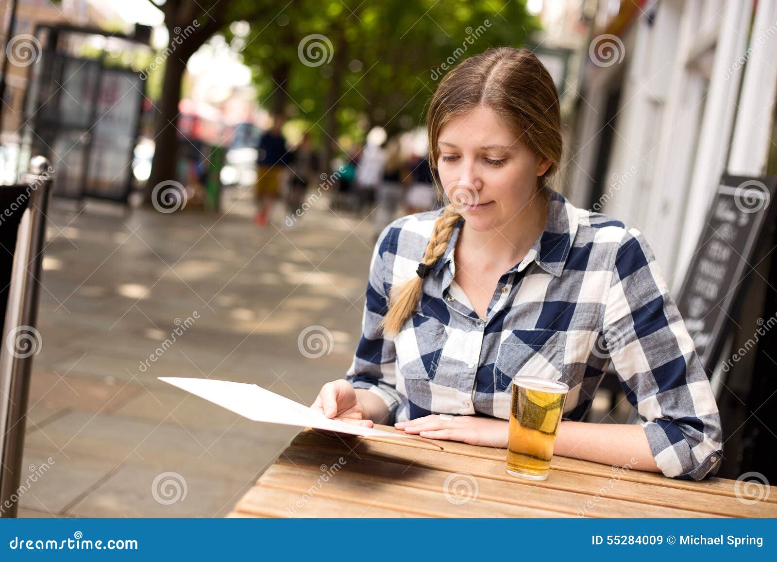 Woman reading menu stock image. Image of customer, lifestyle - 55284009