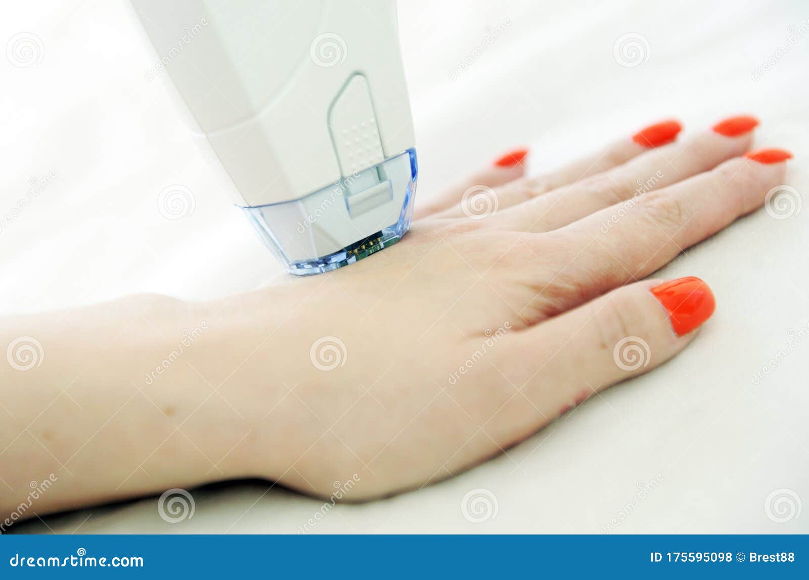 woman receives laser and ultrasound treatment of face and body and hands in a medical sanatorium, skin rejuvenation concept