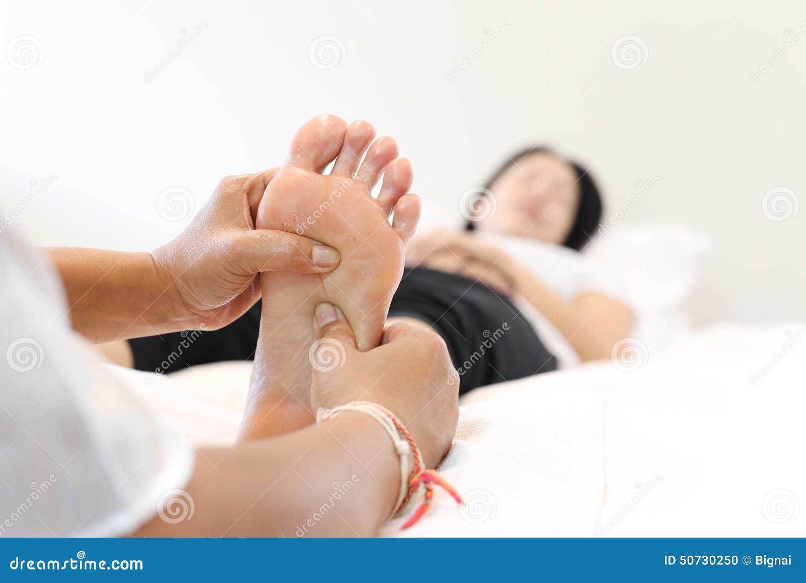 Women feet massaging