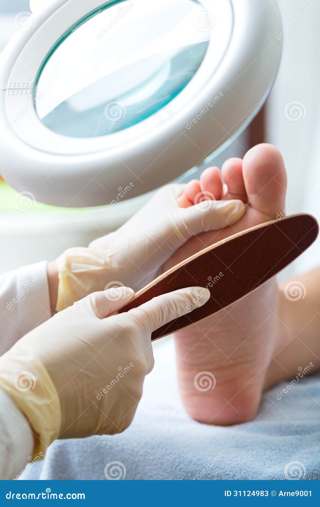 woman receiving podiatry treatment in day spa