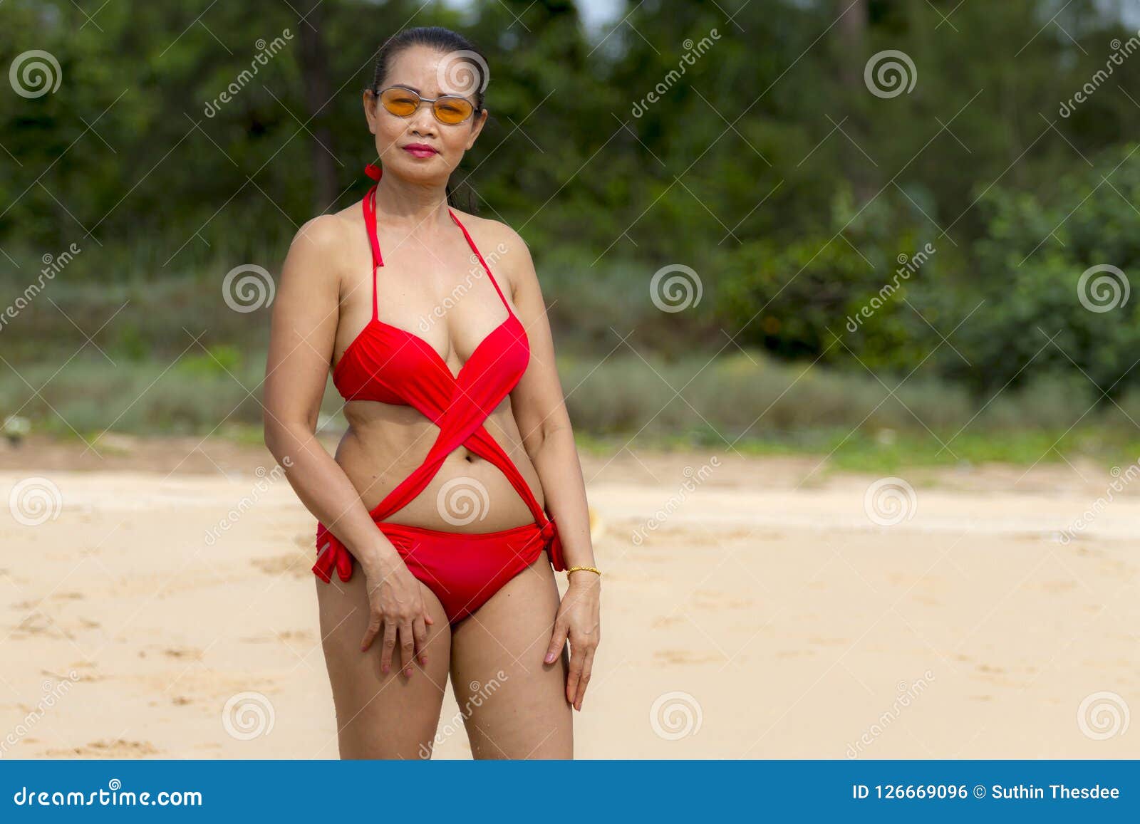 Woman In Red Bikini Sex Symbol With Sunshine On Beach