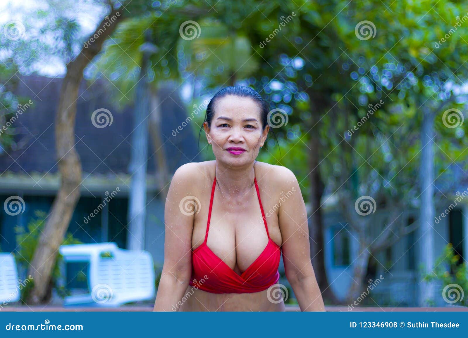 Woman with Red Bikini Sex Symbol at Swimming Pool on Beach Stock Photo image picture