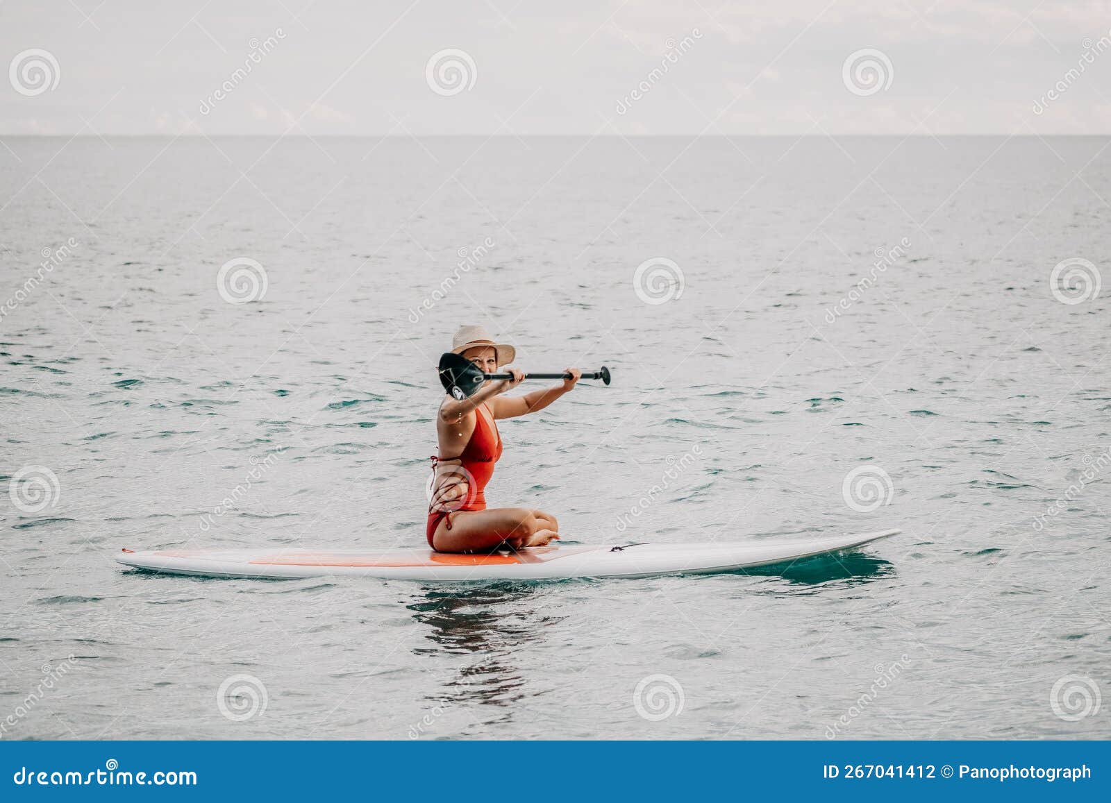 Woman in Red Bikini on Sup Board. Happy Lady with Blond Hair in Red ...