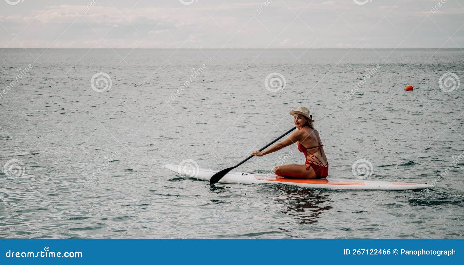 Woman in Red Bikini on Sup Board. Happy Lady with Blond Hair in Red ...