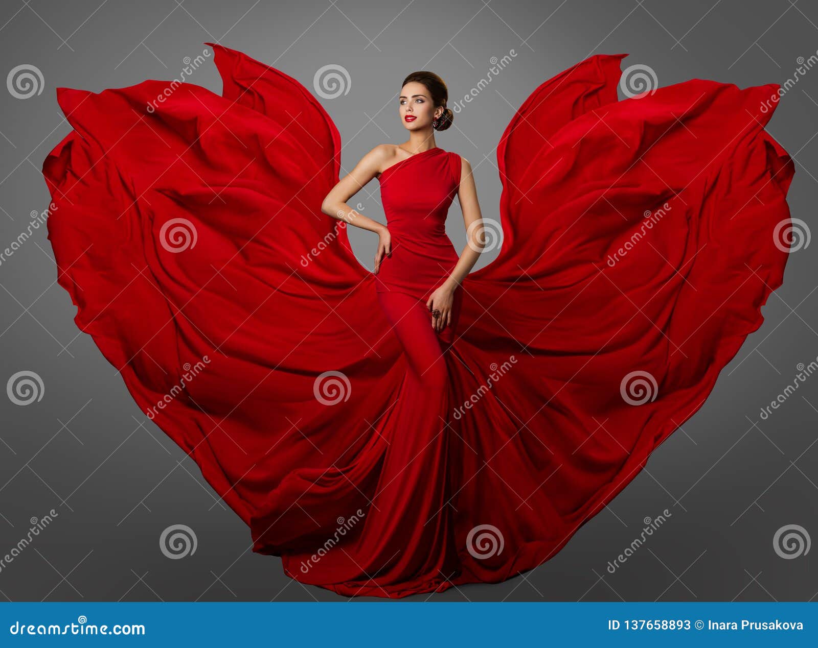 woman red dress, fashion model in long silk waving gown wings, flying fluttering fabric