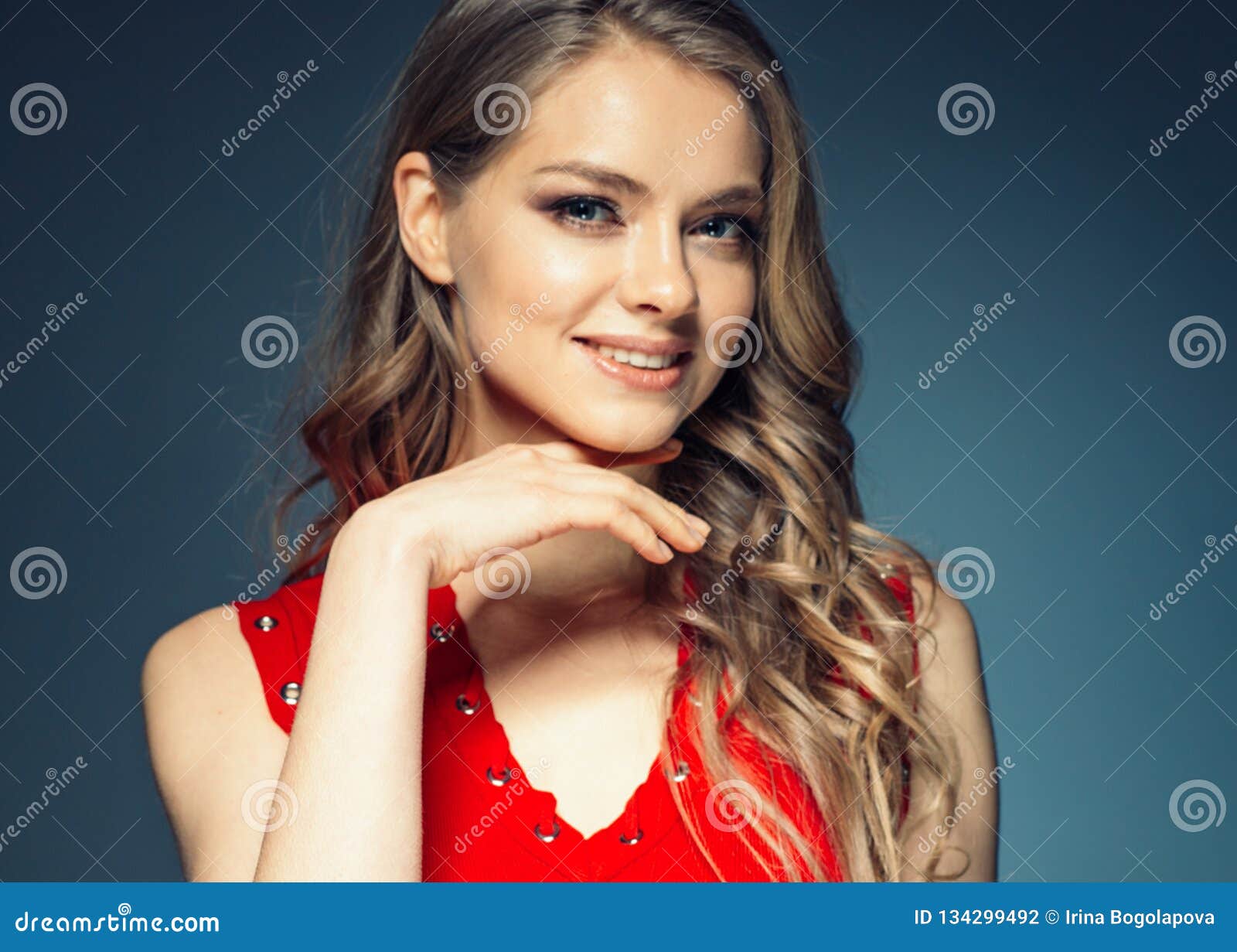 Woman in Red Dress with Long Blonde Hair Stock Photo - Image of makeup ...
