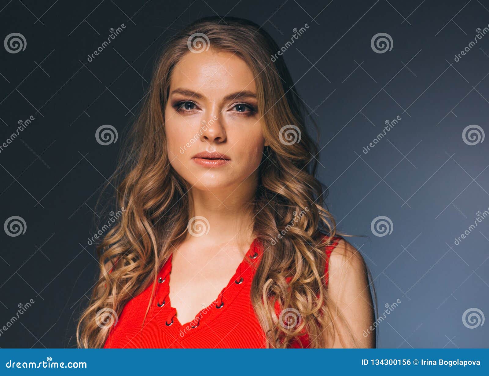 Woman in Red Dress with Long Blonde Hair Stock Photo - Image of motion ...