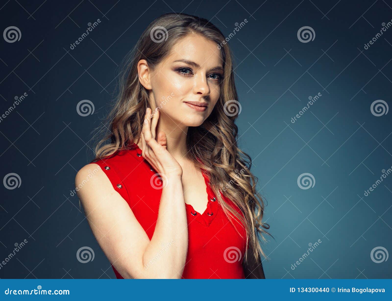 Woman in Red Dress with Long Blonde Hair Stock Photo - Image of breast ...
