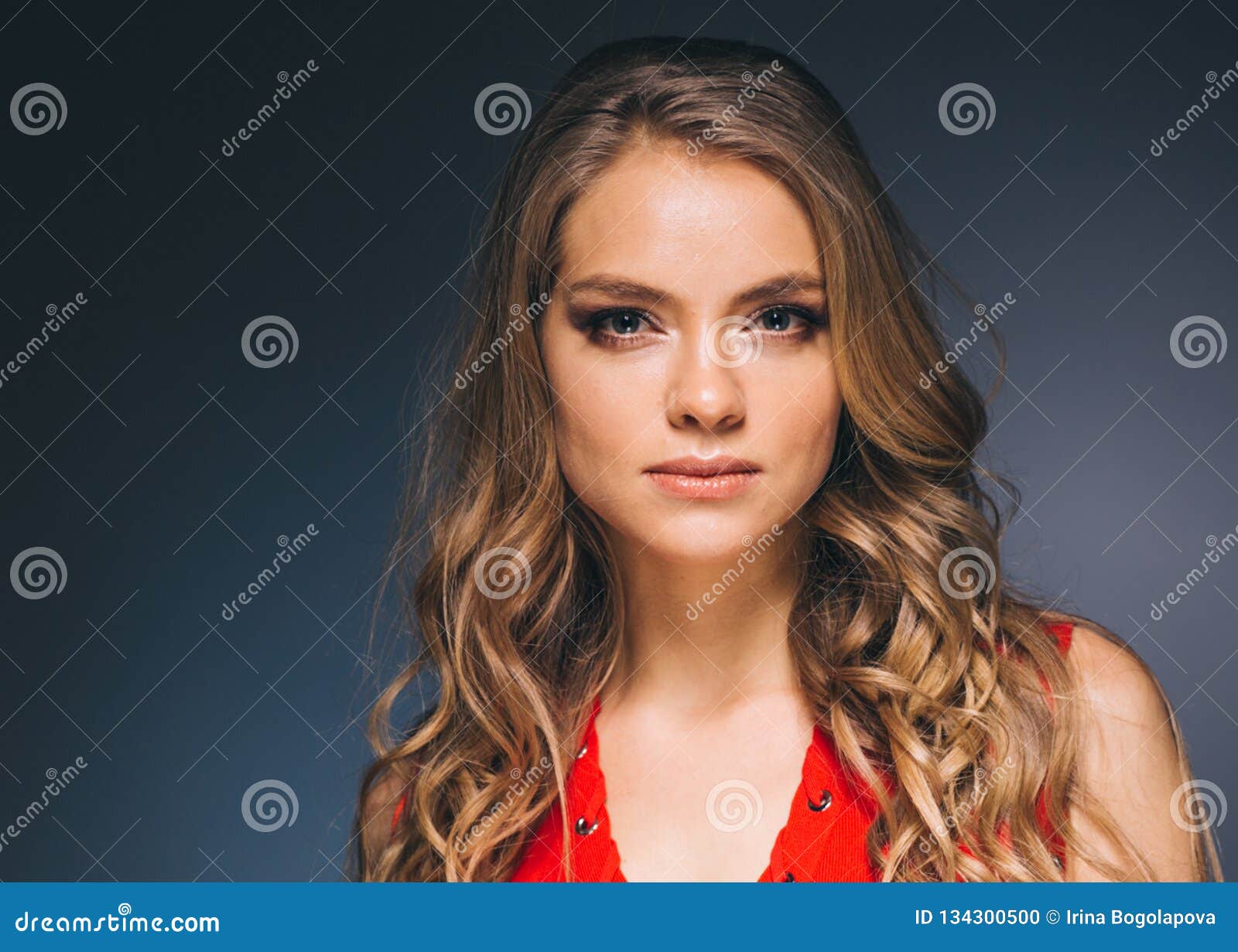 Woman in Red Dress with Long Blonde Hair Stock Photo - Image of dark ...