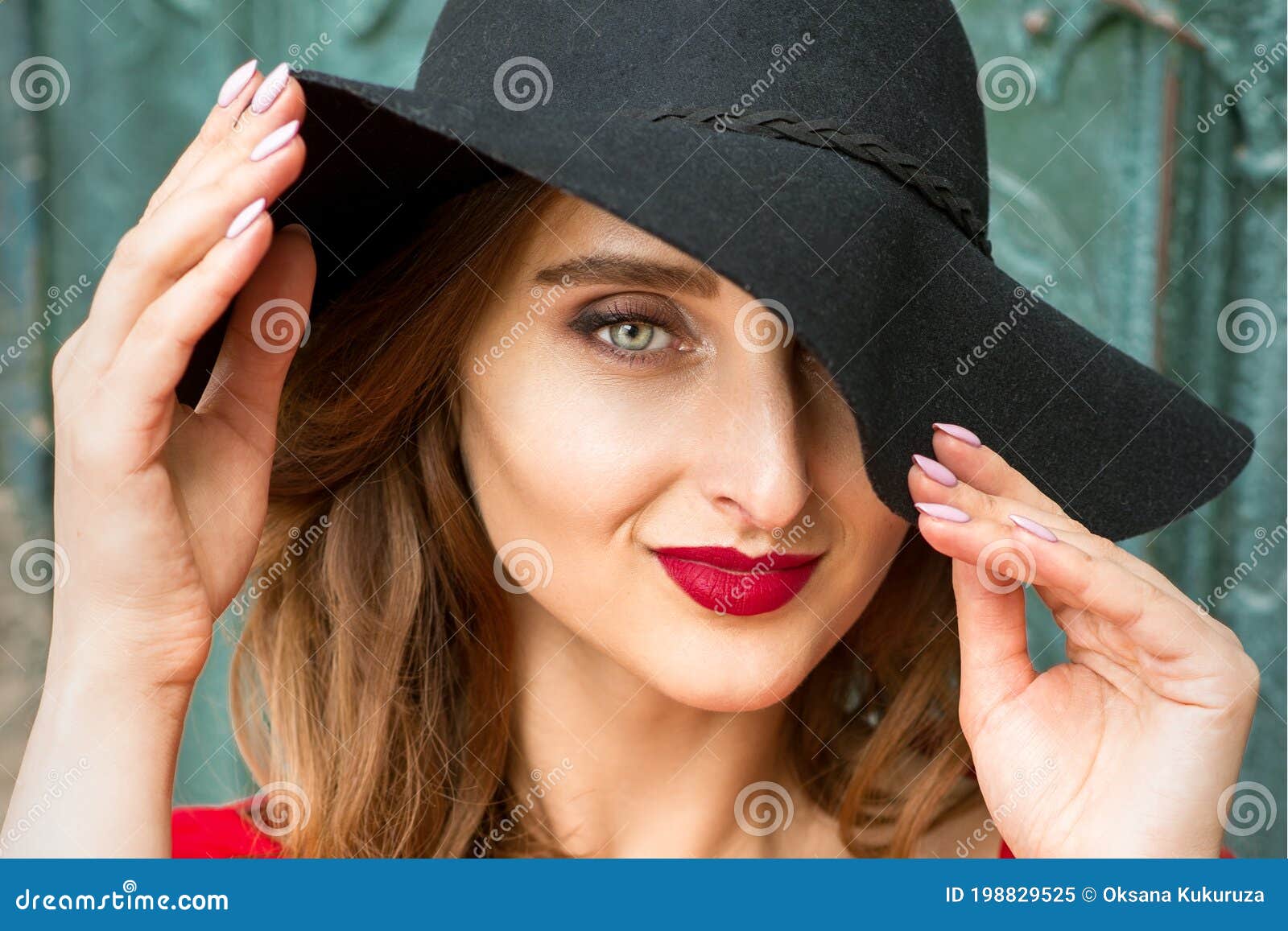 Woman in Red Dress Wearing Black Hat Stock Image - Image of dark ...