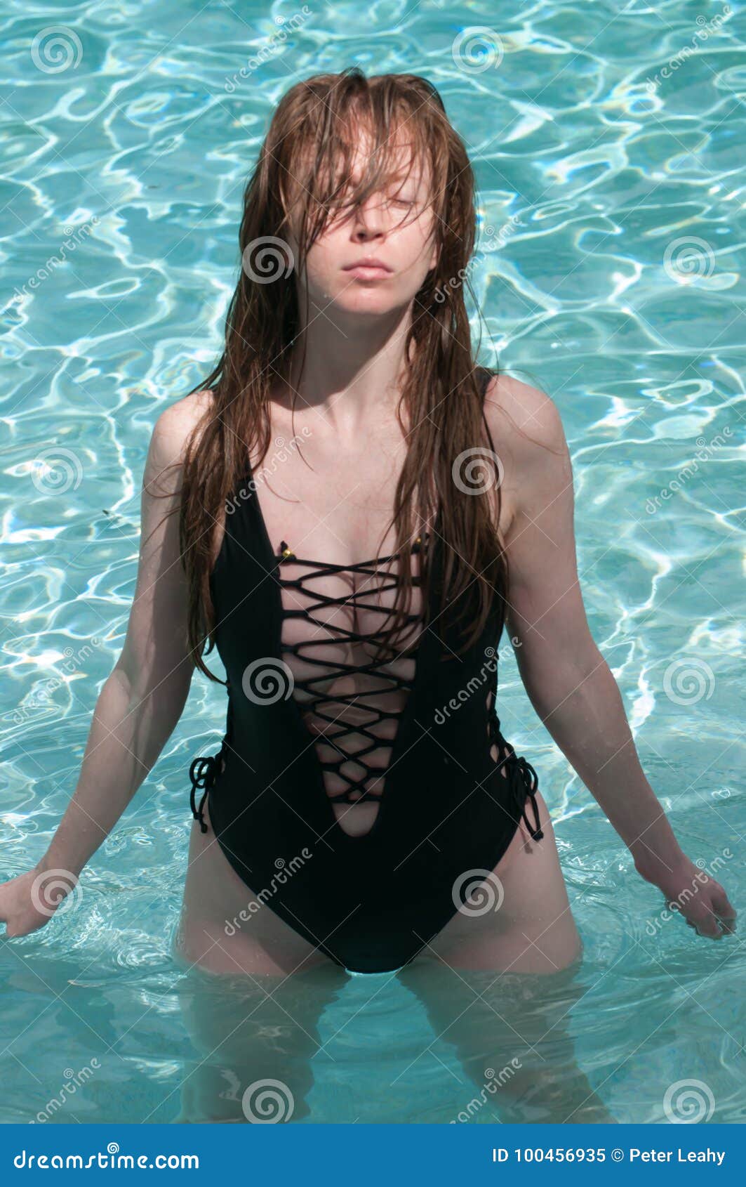 https://thumbs.dreamstime.com/z/woman-red-hair-below-above-surface-model-long-pool-water-100456935.jpg