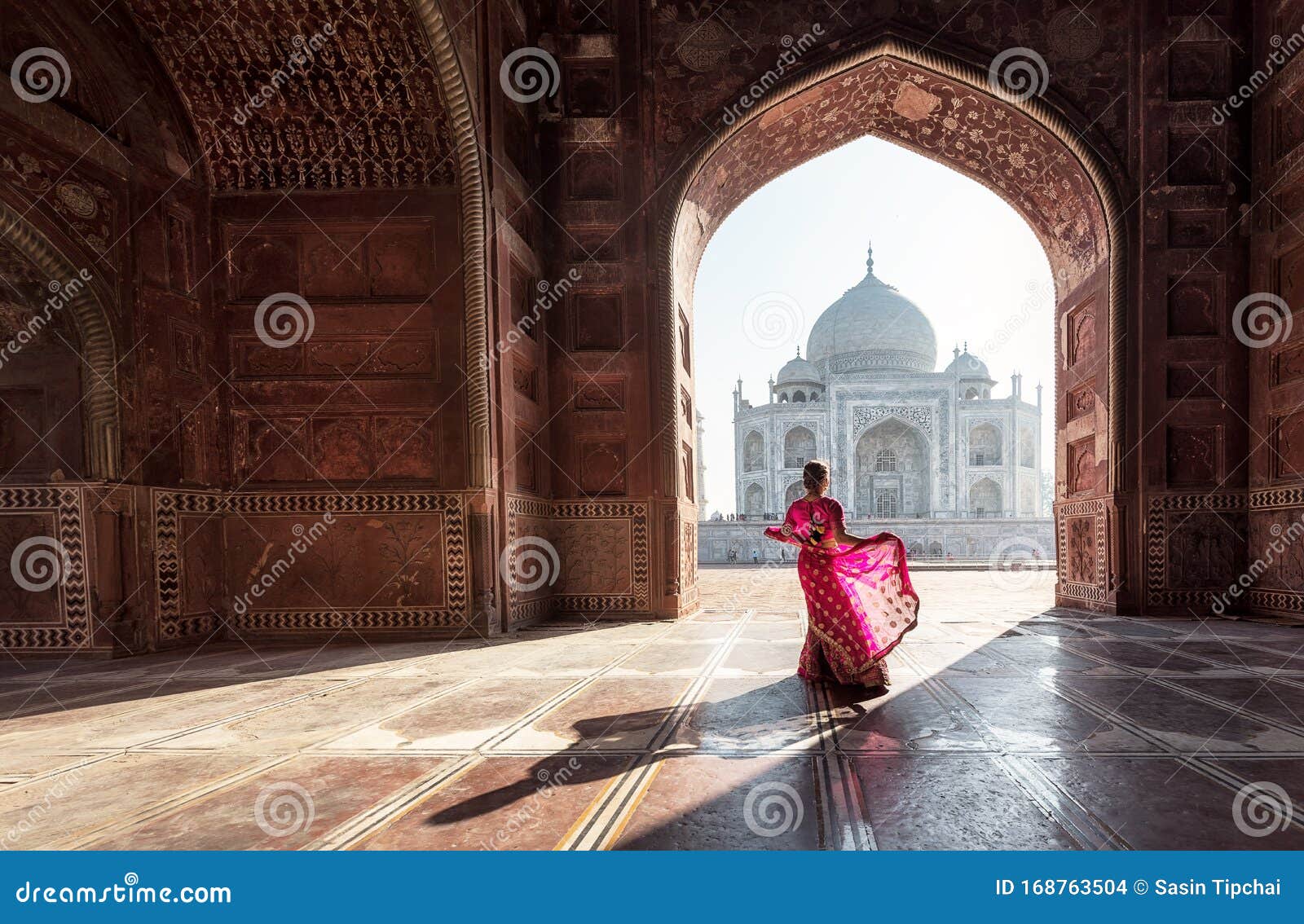 woman in red saree/sari in the taj mahal, agra, uttar pradesh, india